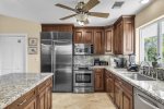 Sub Zero Refrigerator with Stainless Steel Appliances